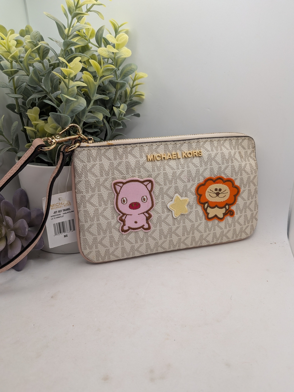 MICHAEL KORS Beige Signature Wristlet with Cute Patch Accents